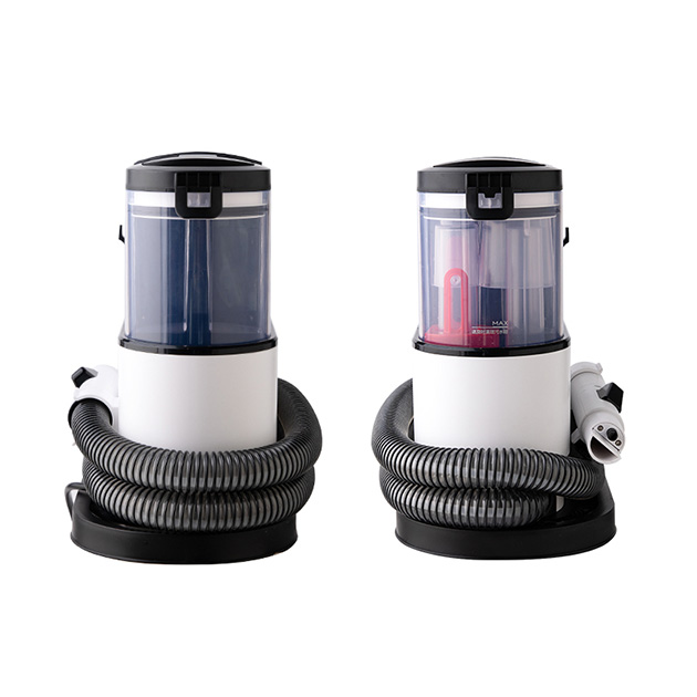 Las partes de la manguera y el depósito de una aspiradora.